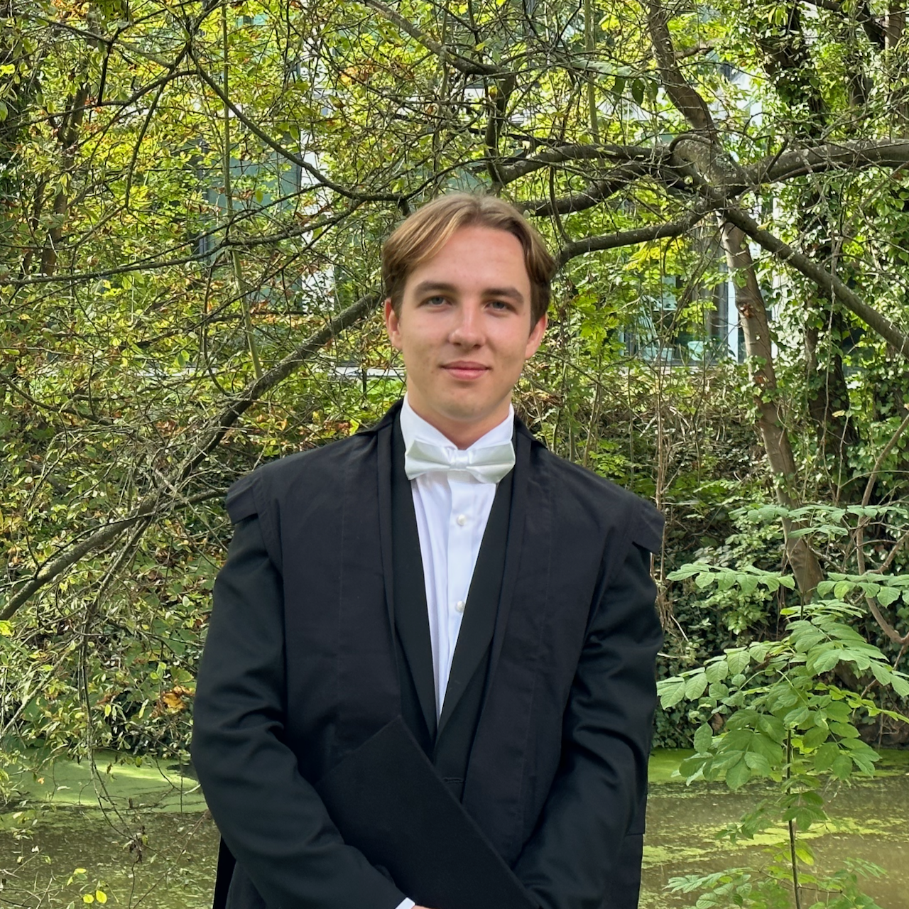 Will standing in front of trees